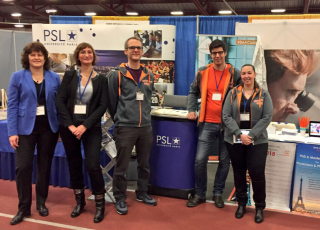 Isabelle Catto, doyenne de la formation, Audrene Eloit et des membres de l'Institut Curie membre de l'Université PSL sur leurs stands au MIT Career Fair 2018